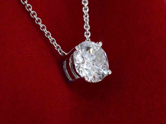 Witgouden halsketting met een diamant van 0.70 carat - afbeelding 1 van  5