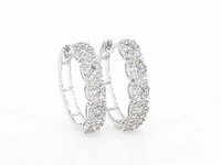 Witgouden oorbellen vijf chatons diamant