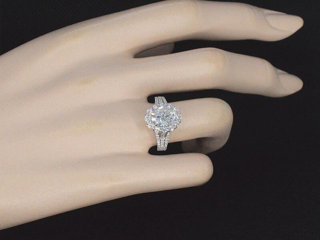 Witgouden ring met diamanten en een 2.11 carat oval shape - afbeelding 2 van  6