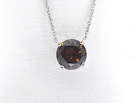 Witgouden solitair ketting met een cognac gekleurde diamant van 1.00 carat
