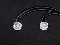 Witgouden solitair oorbellen met 4.00 carat aan natuurlijke diamanten