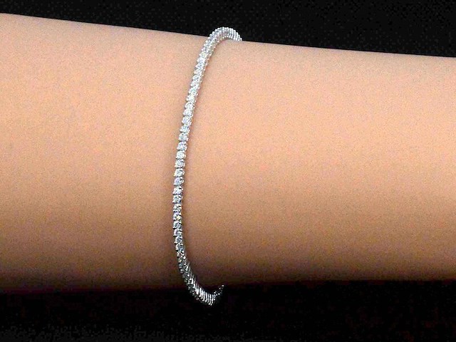 Witgouden tennisarmband met 1.50 carat diamanten - afbeelding 2 van  6