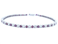 Witgouden tennisarmband met diamanten en robijnen - afbeelding 1 van  8