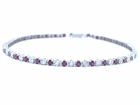 Witgouden tennisarmband met diamanten en robijnen