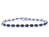 Witgouden tennisarmband met diamanten en saffier