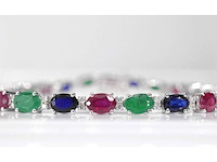Witgouden tennisarmband met diamanten, saffier, robijn en smaragd