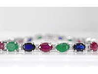 Witgouden tennisarmband met diamanten, saffier, robijn en smaragd