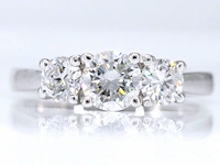 Witgouden trinity ring met briljant geslepen diamanten