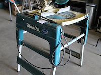 Zaagtafel makita flipper lf1000. bouwjaar 2018. let op: instelbeugel achter de zaag afgebroken. - afbeelding 2 van  6