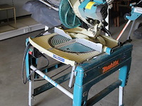 Zaagtafel makita flipper lf1000. bouwjaar 2018. let op: instelbeugel achter de zaag afgebroken. - afbeelding 3 van  6