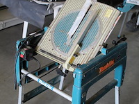 Zaagtafel makita flipper lf1000. bouwjaar 2018. let op: instelbeugel achter de zaag afgebroken. - afbeelding 5 van  6