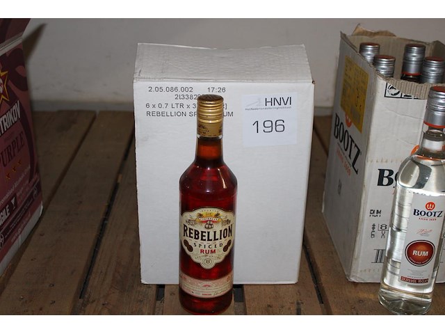 Zeven flessen rum rebellion. - afbeelding 1 van  2