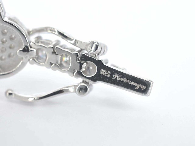 Zilverkleurige schakelarmband bezet met briljanten - afbeelding 7 van  8